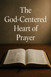 Open Bible on a wooden table illuminated by warm light, with the title “The God-Centered Heart of Prayer” displayed above in white serif font.