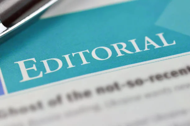 Heading a Editorial in the newpaper. Concept Editorial. Shallow DOF.