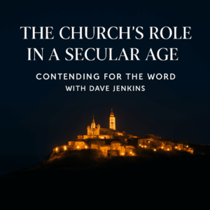 A glowing city on a hill at night, symbolizing the church as a beacon of light in a dark world.