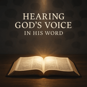 Hand holding a Bible shining with light in darkness, representing God’s Word as the true voice of the Spirit.