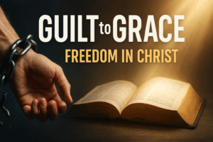 Broken chains falling away beside an open Bible with light, symbolizing freedom from condemnation through Christ.