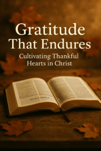 Open Bible on a wooden table with warm golden autumn light and soft leaves, with text reading ‘Gratitude That Endures.