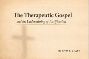 Light parchment-style theological graphic with the title ‘The Therapeutic Gospel and the Undermining of Justification,’ a faint cross in the background, and the author credit ‘By Gary E. Gilley’ in the lower corner.