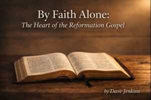 Warm, low-light theological graphic featuring an open Bible on a wooden table beneath the title ‘By Faith Alone: The Heart of the Reformation Gospel,’ with the author credit ‘by Dave Jenkins’ in the lower corner.
