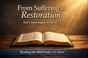 Open Bible on a wooden table illuminated by warm light, symbolizing God’s sovereignty and restoration in Job 42, Reading the Bible Daily with Dave.