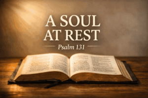 Thumbnail for a Bible teaching video titled “A Soul at Rest — Psalm 131” showing an open Bible on a wooden table with warm light shining across the pages.