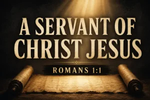 Dark charcoal sermon graphic with a golden beam of light shining over an ancient scroll, featuring the words “A Servant of Christ Jesus” and “Romans 1:1.