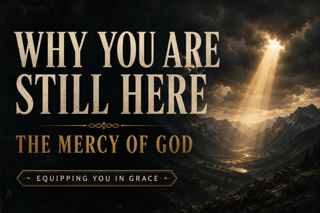The Mercy of God: Why You Are Not Consumed 2 Dramatic mountain valley beneath dark storm clouds with a single beam of golden light breaking through the darkness, illuminating the distant landscape. Cream serif typography and muted gold accents emphasize God's mercy, hope, and sustaining grace against a deep charcoal textured background.
