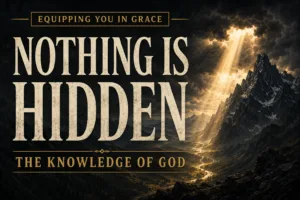 Deep charcoal mountain landscape beneath dramatic storm clouds with a brilliant beam of golden light breaking through the darkness and illuminating a winding valley below. Large cream serif text reads “Nothing Is Hidden” with “The Knowledge of God” beneath it and an Equipping You in Grace banner at the top. The image conveys God's perfect knowledge, holiness, and sovereign awareness of all things.
