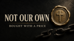 We are not our own, bought with a price, represented by a gold cross seal and broken chain on a dark charcoal background.