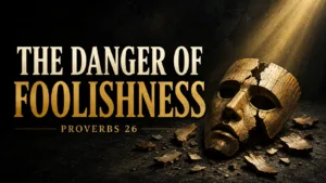 The Danger of Foolishness from Proverbs 26, featuring a cracked wooden mask surrounded by broken pieces under a golden beam of light.