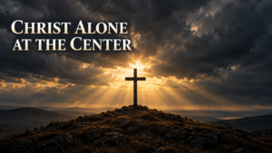 Wooden cross on a hill beneath dark storm clouds and golden rays of light, with the words “Christ Alone at the Center.